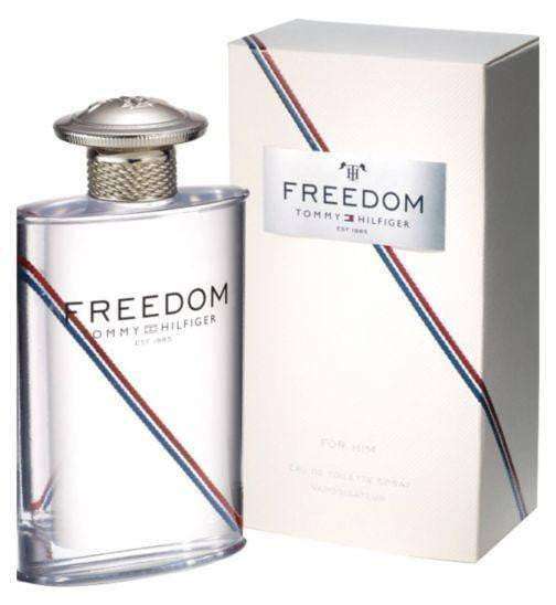 Tommy Hilfiger Freedom for Him 100ml Eau De Toilette in a clear rectangular bottle next to its white box with red and blue stripes.