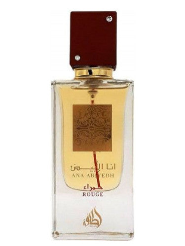 A bottle of Lattafa Ana Abiyedh Rouge 60ml Eau De Parfum with arabic writing on it from Dubai Perfumes.