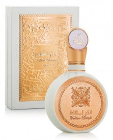 A bottle of Lattafa Fakhar Femme 100ml Eau de Parfum with a gold box.