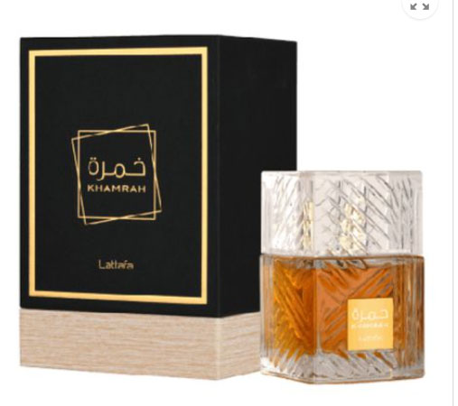 A bottle of Lattafa Khamrah 100ml Eau De Parfum with a box next to it.