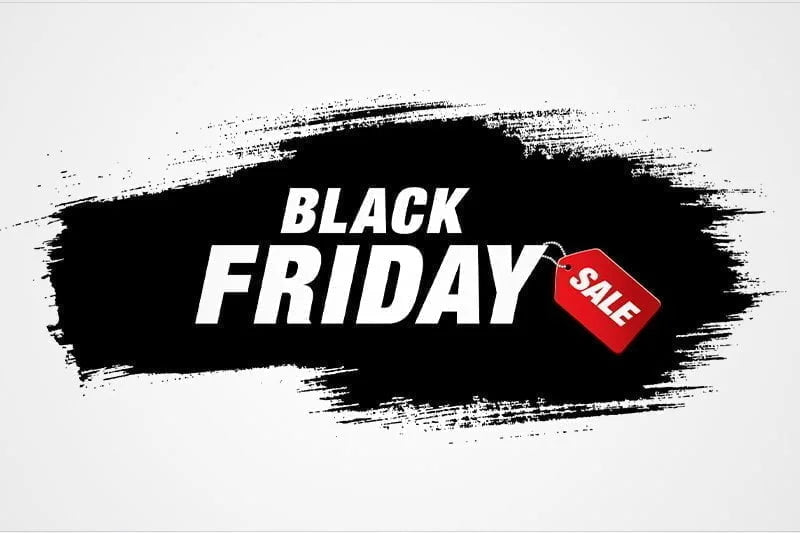 Black Friday sale promotional graphic with white text on a black brushstroke background and a red sale tag.