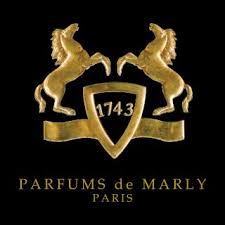 Gold emblem with two rearing horses facing each other, a shield marked "1743," and the text "PARFUMS de MARLY PARIS" on a black background.