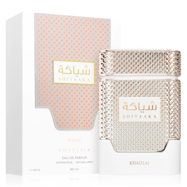 The Khadlaj Shiyaaka White 100ml eau de parfum for men, featuring a sweet-citrusy scent and a gold and white design, is displayed beside its matching packaging box.