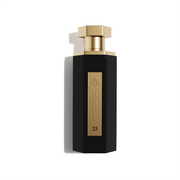 Reef 33 100ml EDP by Reef features a black hexagonal bottle with gold accents and a gold cap, labeled "REEF 33". This unisex Eau De Parfum offers a bold and sophisticated fragrance for those who appreciate elegance.