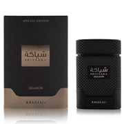A black bottle of Khadlaj Shiyaaka Shadow 100ml is showcased beside its matching black and gold "Special Edition" box, emphasizing this premium men’s fragrance by Khadlaj.