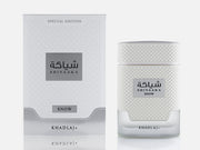 The Khadlaj Shiyaaka Snow 100ml EDP is a white, textured unisex perfume with a matching box, both featuring KHADLAJ and "Special Edition." Its citrus-aromatic scent makes it perfect for any occasion.