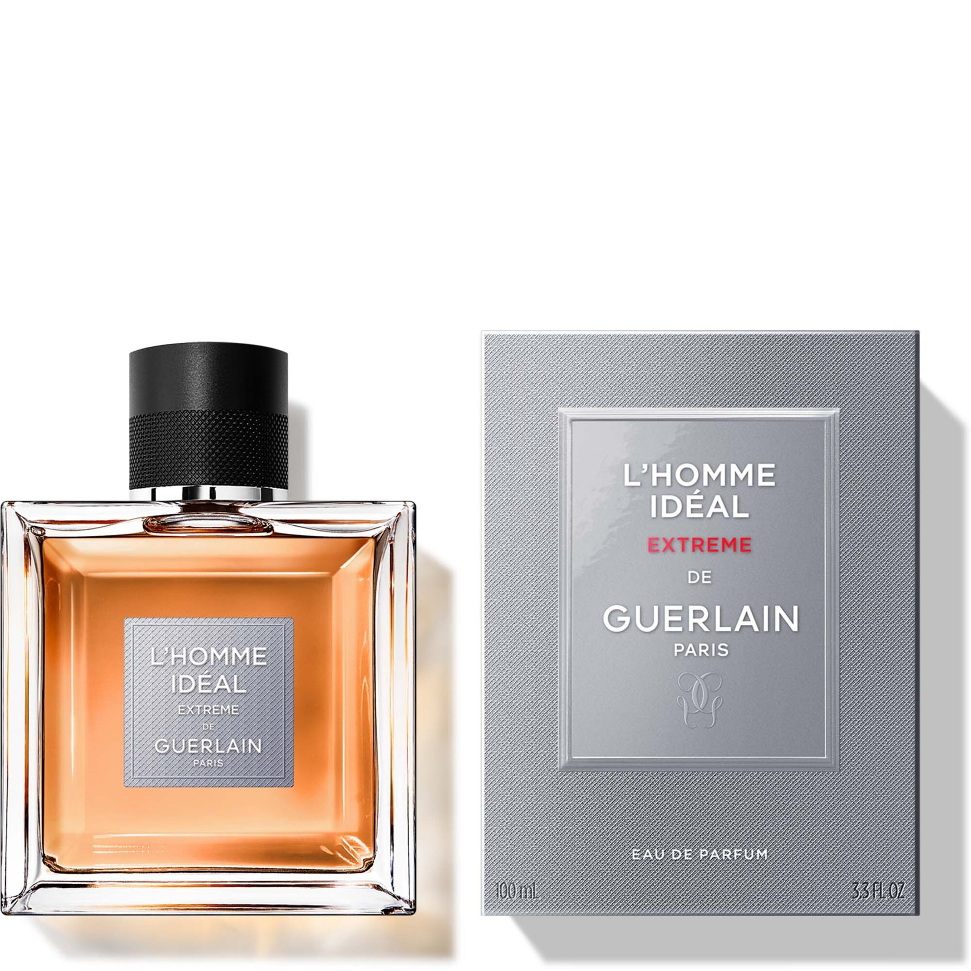 A bottle of Guerlain L’Homme Ideal Extreme 100ml Eau De Parfum is displayed beside its matching grey box packaging.