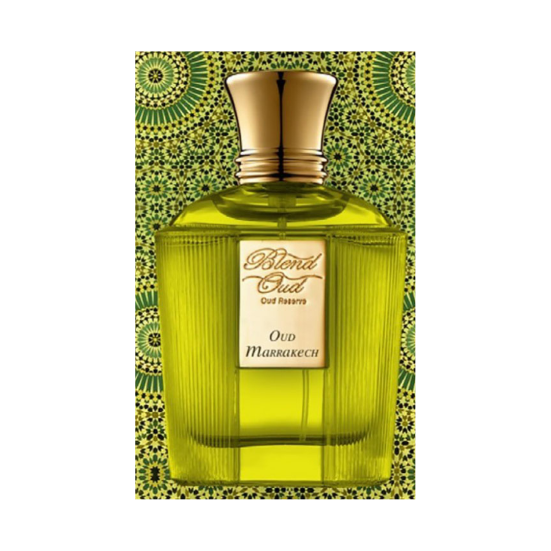 A 60ml yellow-green "Blend Oud Voyage Collection Oud Marrakech" Eau de Parfum by Rio Perfumes features a gold cap with an enchanting fragrance, set against a striking green and yellow geometric pattern echoing the essence of Oud Marrakech.
