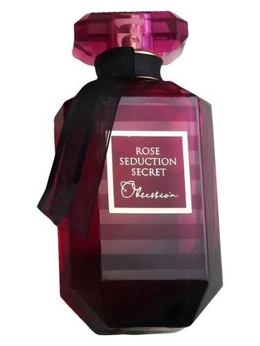 The Fragrance World Rose Seduction Secret Obsession 100ml EDP is a faceted, dark pink perfume bottle with a black ribbon—a captivating floral fragrance for women from Fragrance World.
