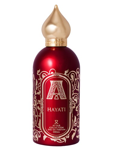 Attar Collection Hayati 100ml EDP by Attar Collection is a unisex eau de parfum in a red and gold bottle with ornate patterns and a pointed gold cap.