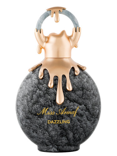 The Miss Armaf Dazzling 100ml EDP by Armaf is a spherical perfume bottle with a textured black surface, gold accents, "Miss Armaf Dazzling" text, and a cap adorned with decorative gold drips, capturing the sophisticated allure of this women's fragrance.