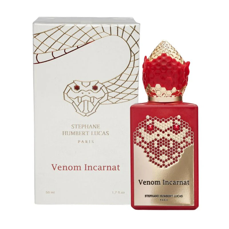 A red and gold bottle of Stéphane Humbert Lucas 777 Snake Collection Venom Incarnat 50ml EDP is shown next to its white box, which displays a bold snake design and the product name.