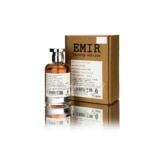 A bottle of Emir Warm Leather Factory Edition 100ml Eau De Parfum by Paris Corner for men and women in front of a box.