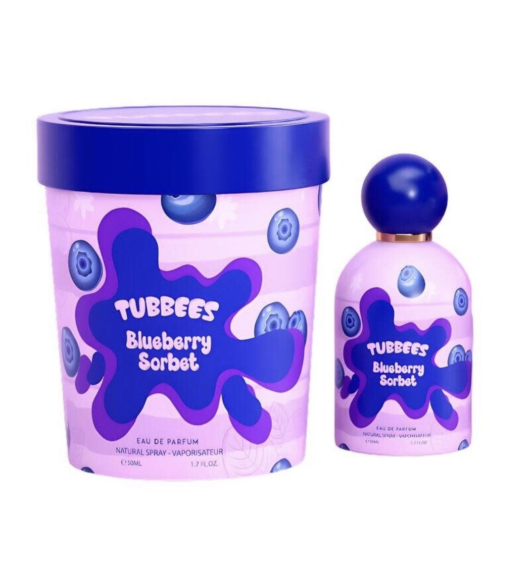 A tub and bottle of Tubbies Blueberry Sorbet, both in purple packaging with blueberry and splash designs, offering a fruity floral scent that makes this unisex fragrance irresistible.