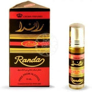 A 6ml bottle of King Perfumes Crown Perfumes Al-Rehab Randa concentrated oil perfume is displayed beside its black and red box, labeled "Free From Alcohol" and "Crown Perfumes.