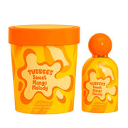 The Tubbies Tubbees Sweet Mango Melody unisex perfume comes in a yellow-orange bottle with a matching cylindrical box featuring bold, wavy designs and offers a playful mango fragrance.