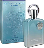 A 100ml blue bottle of Afnan Supremacy in Heaven EDP is shown beside its box, featuring a silver cap and decorative emblem.