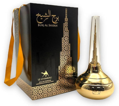 A bottle of Dubai Perfumes Le Chameau Burj Al Sheikh 100ml Eau De Parfum beside its packaging.