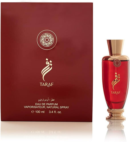 A luxurious fragrance bottle of Arabian Oud Taraf 100ml Eau De Parfum from Rio Perfumes is showcased elegantly in front of an exquisite box.