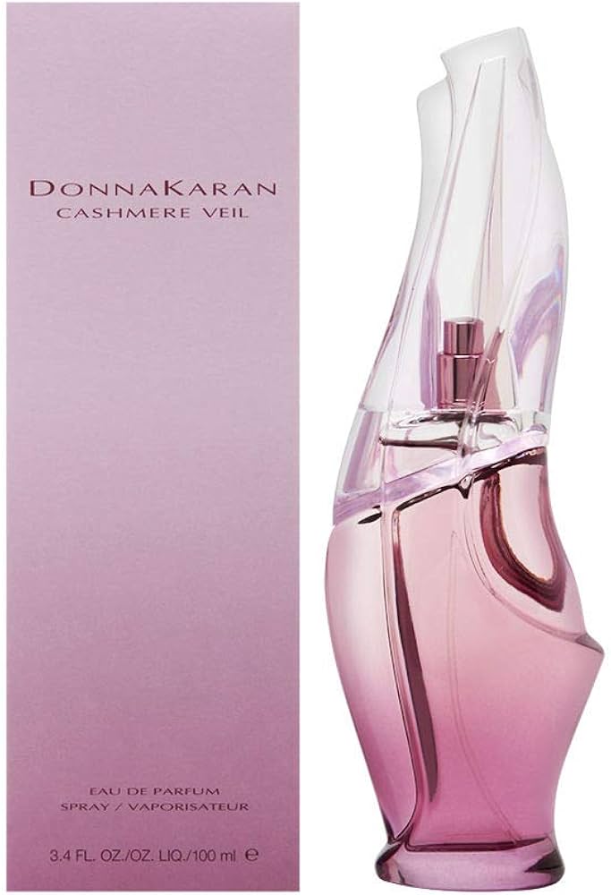 DKNY Cashmere Veil 100ml EDP comes in a sculpted bottle with a pink gradient and a pale mauve box. This elegant women’s fragrance reflects the sophistication and style of DKNY, as detailed on its packaging.