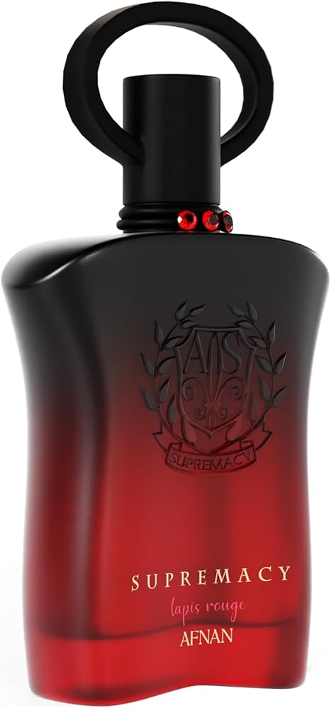 Afnan Supremacy Tapis Rouge 90ml EDP features a red and black gradient bottle with an embossed crest and circular cap. This floral fruity fragrance by Afnan offers a captivating scent for women.
