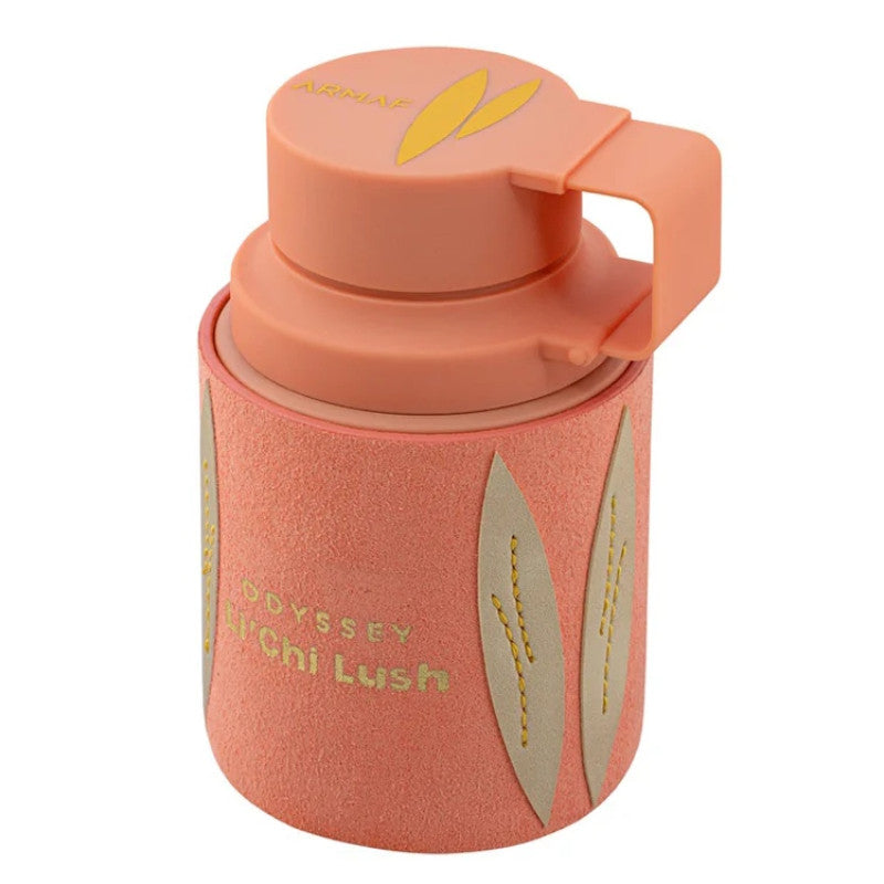 A compact, peach-colored insulated bottle featuring a wide lid and delicate leaf motif, with “Armaf Odyssey Li’chi Lush” printed on its soft-textured surface—designed to evoke the fruity floral notes of Armaf Odyssey Li’chi Lush 100ml Eau de Parfum.
