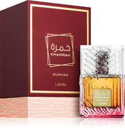 Lattafa Khamrah Dukhan 100ml Eau De Parfum by Lattafa is shown beside its elegant red and gold box, highlighting this luxurious unisex fragrance.
