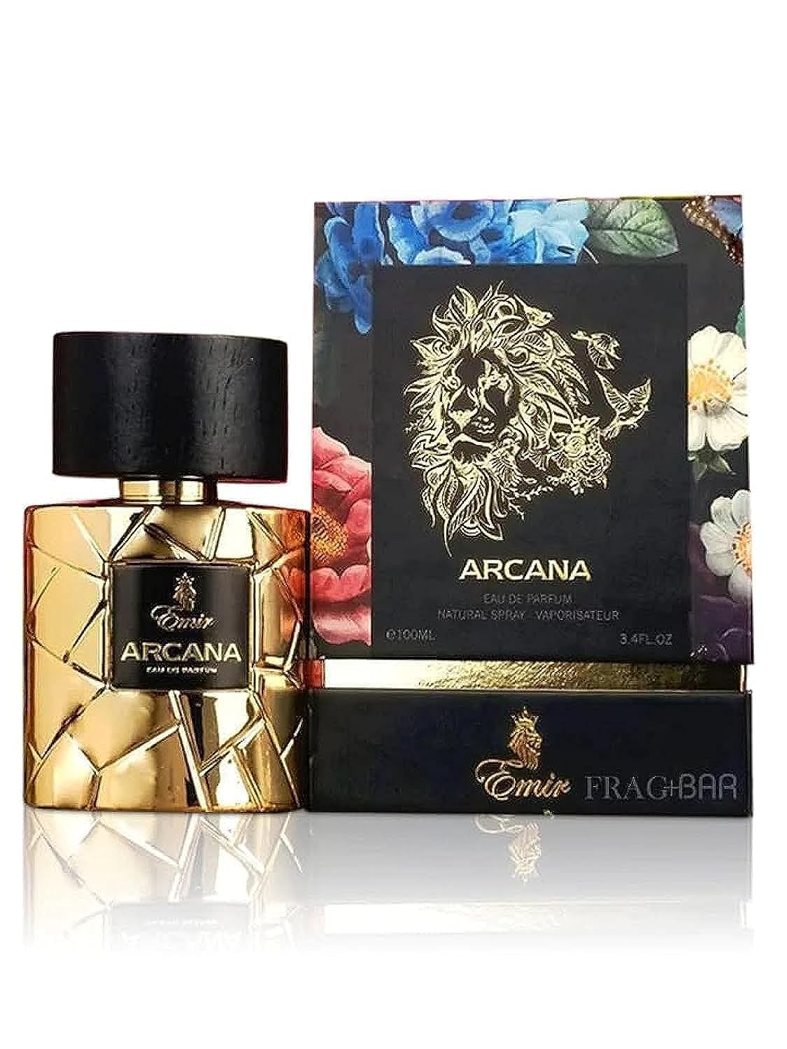 A bottle of Emir Arcana 100ml Eau De Parfum is displayed beside its decorative box, showcasing a gold textured design with floral artwork and a lion illustration.