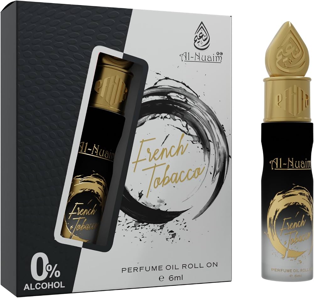 The Al-Nuaim French Tobacco Oil Perfume comes in a 6ml roll-on bottle with 0% alcohol, presented in packaging adorned with black, gold, and white design accents. This fragrance by Al-Nuaim captures the rich essence of tobacco leaf for a refined and sophisticated scent experience.