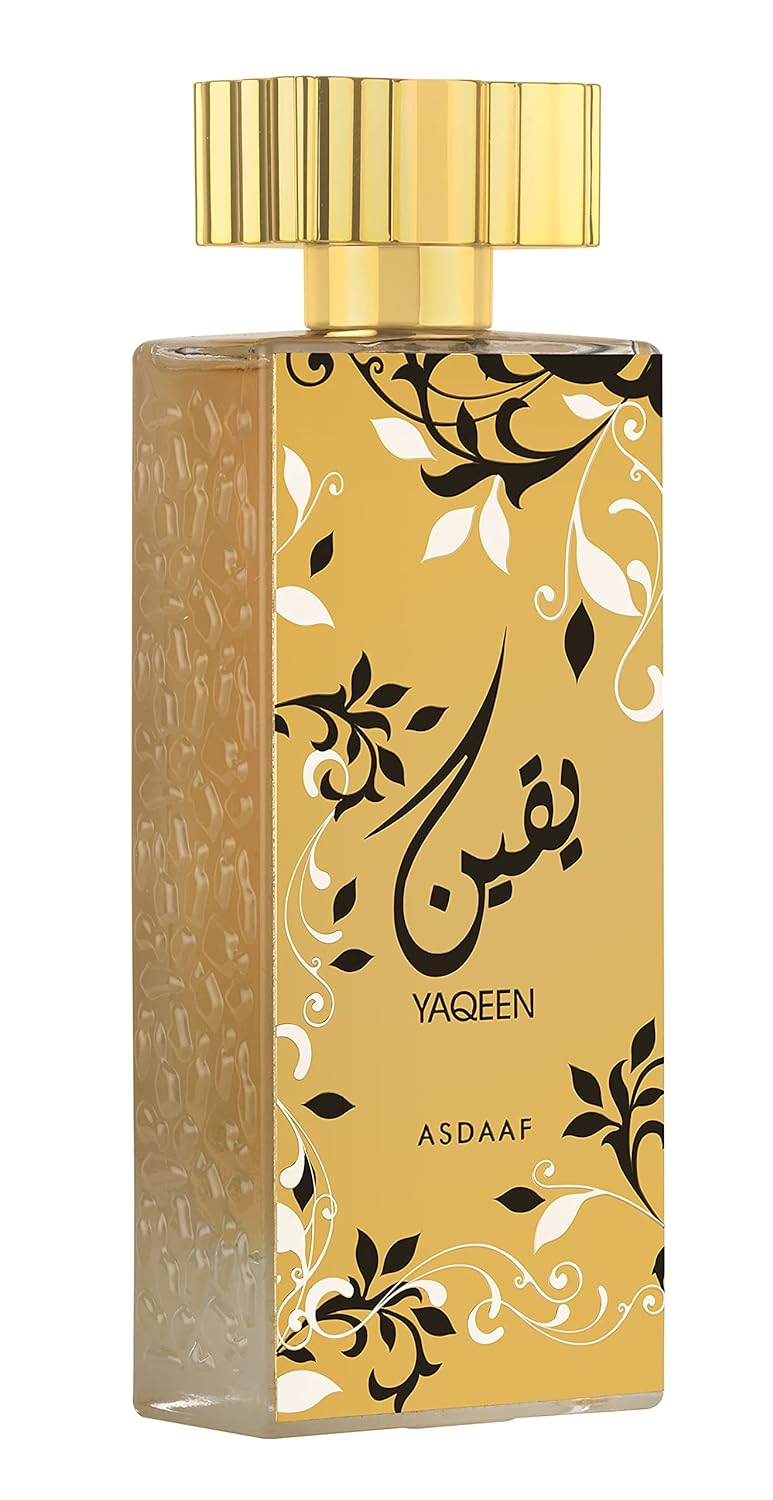 Load image into Gallery viewer, A bottle of Dubai Perfumes Asdaaf Yaqeen 100ml Eau De Parfum, featuring an ornate gold and black design.
