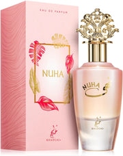 A pink and gold Khadlaj Nuha 85ml unisex perfume bottle stands beside its matching decorative pink box.