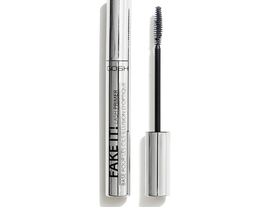 A silver tube of The GOSH Fake It! Lash Primer 001 Grey by GOSH with the cap off, revealing a slim mascara wand with black bristles designed to enhance eyelash volume.