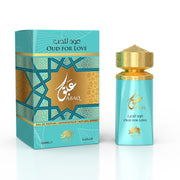A turquoise and gold Al Fares Abaq Oud For Love 100ml Eau De Parfum bottle stands beside its geometric, Arabic-text box—a luxurious unisex fragrance by Al Fares, ideal for any occasion.