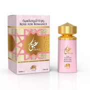 A pink and gold Al Fares Abaq Rose For Romance 100ml Eau De Parfum bottle stands beside its matching box with Arabic and English text—a sophisticated fragrance for men and women.