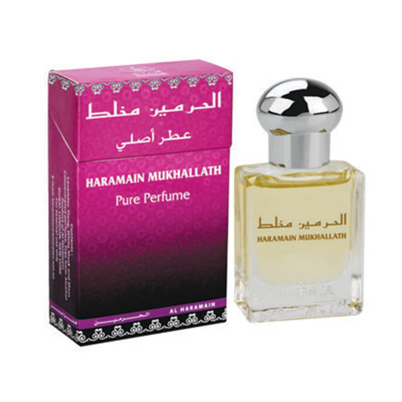 A purple box and glass bottle of Al Haramain Mukhallath Pure Perfume 15ml, topped with a silver cap, present a captivating symphony of fragrance notes.