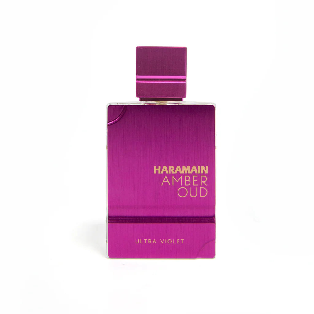 A rectangular metallic purple bottle labeled "AL Haramain Amber Oud Ultra Violet 120ml EDP" by AL Haramain is displayed against a white background, reflecting the elegance of this sophisticated unisex fragrance.