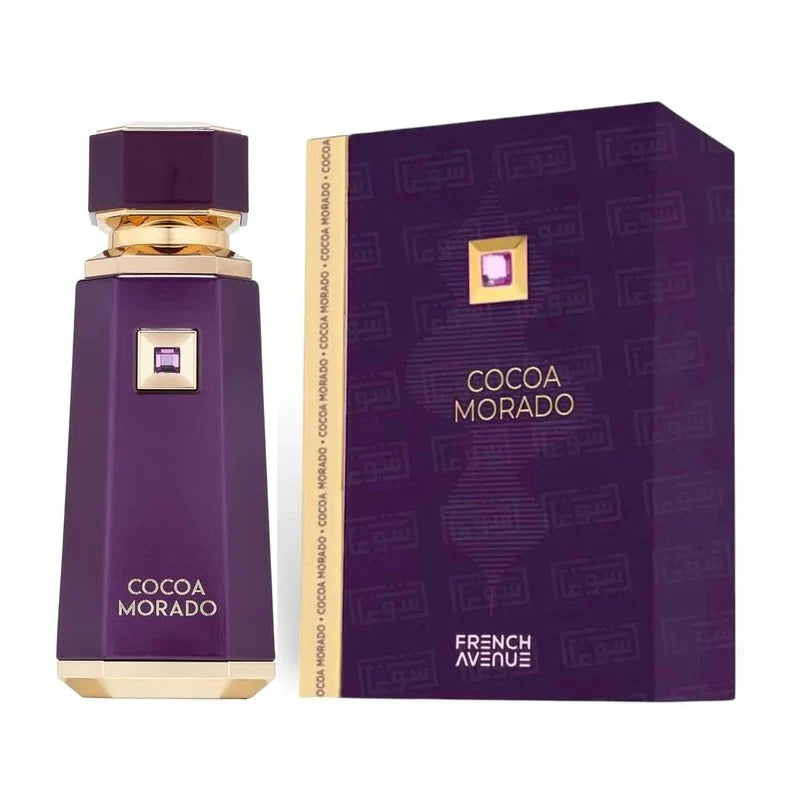 A purple bottle of French Avenue Cocoa Morado 100ml EDP is displayed beside its matching purple and gold box, showcasing the essence of this luxurious Oriental Woody fragrance.