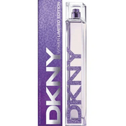 A DKNY Ladies Limited Edition 100ml EDT stands by its matching purple box, both with bold DKNY branding and a glittery finish, celebrating a cheerful fragrance with bergamot and peony notes.