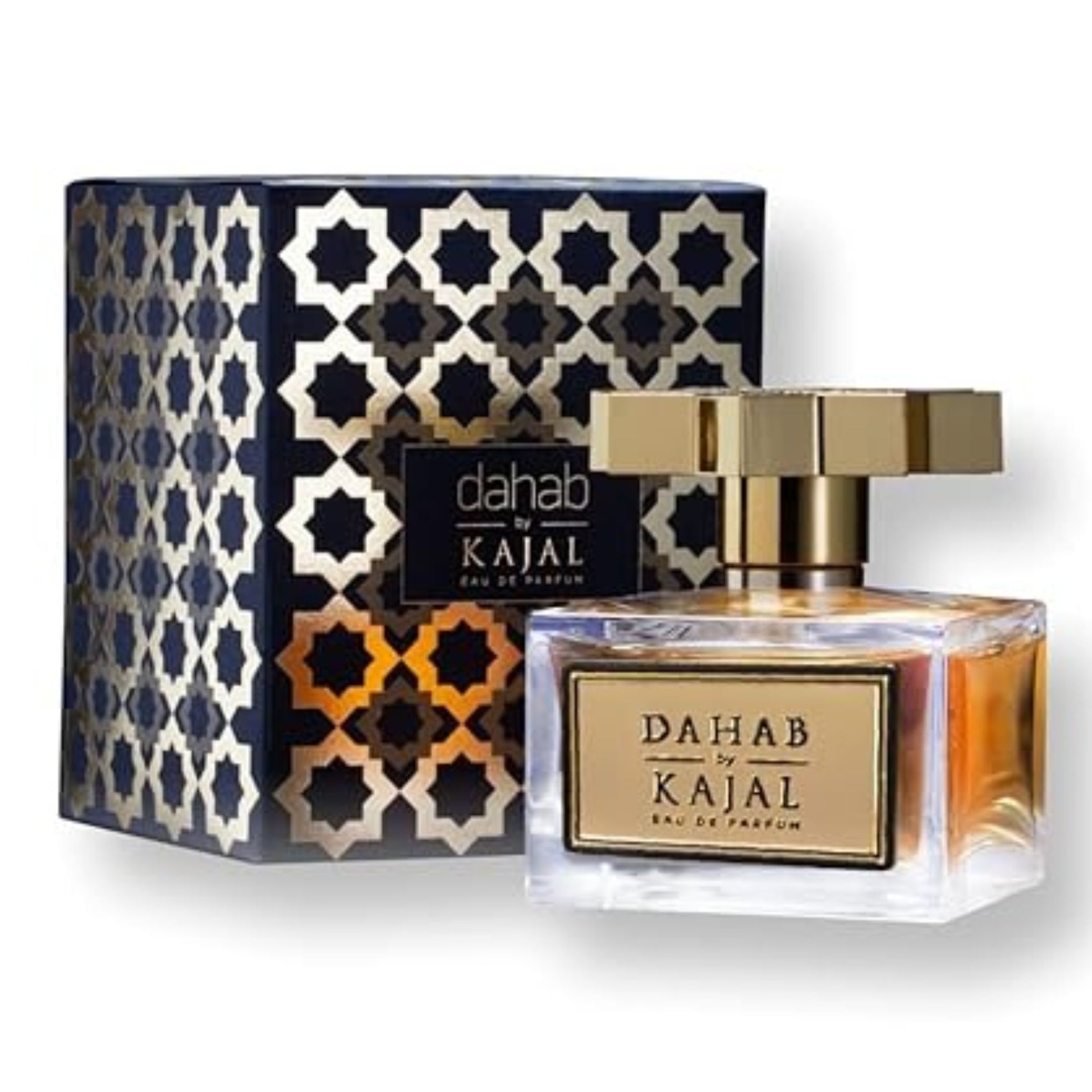 A bottle of Dahab Kajal by Kajal, a luxury perfume with a gold cap, sits in front of its patterned black and gold box.
