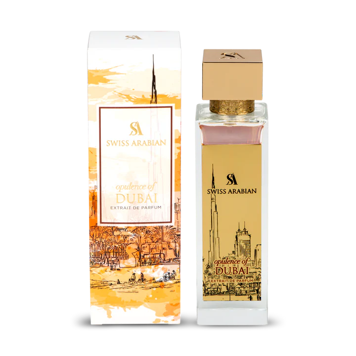 A bottle of Swiss Arabian Opulence Of Dubai 100ml Extrait de Parfum by Swiss Arabian is displayed beside its decorative box adorned with illustrations of the Dubai cityscape.