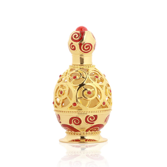 A Khadlaj Haneen Gold Concentrated Perfume Oil 20ml bottle, a concentrated fragrance oil by Dubai Perfumes, on a white surface.