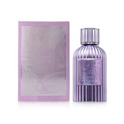 A metallic lavender bottle with vertical ridges sits beside an embossed box labeled "Qissa Gala," presenting the Paris Corner Qissa Gala 100ml Eau De Parfum—a unisex floral fruity gourmand fragrance by Paris Corner.