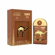 Le Chameau Iconic Dubai III 100ml EDP by Le Chameau is a striking unisex fragrance in a gold camel-themed bottle and box, adorned with gold cityscape and Arabic text accents.