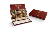 An open red box reveals the Joya de Nicaragua Limited Edition Ultimate Jewel Collection - 14 Cigars, each with labeled bands, beside a closed matching box on a white background.