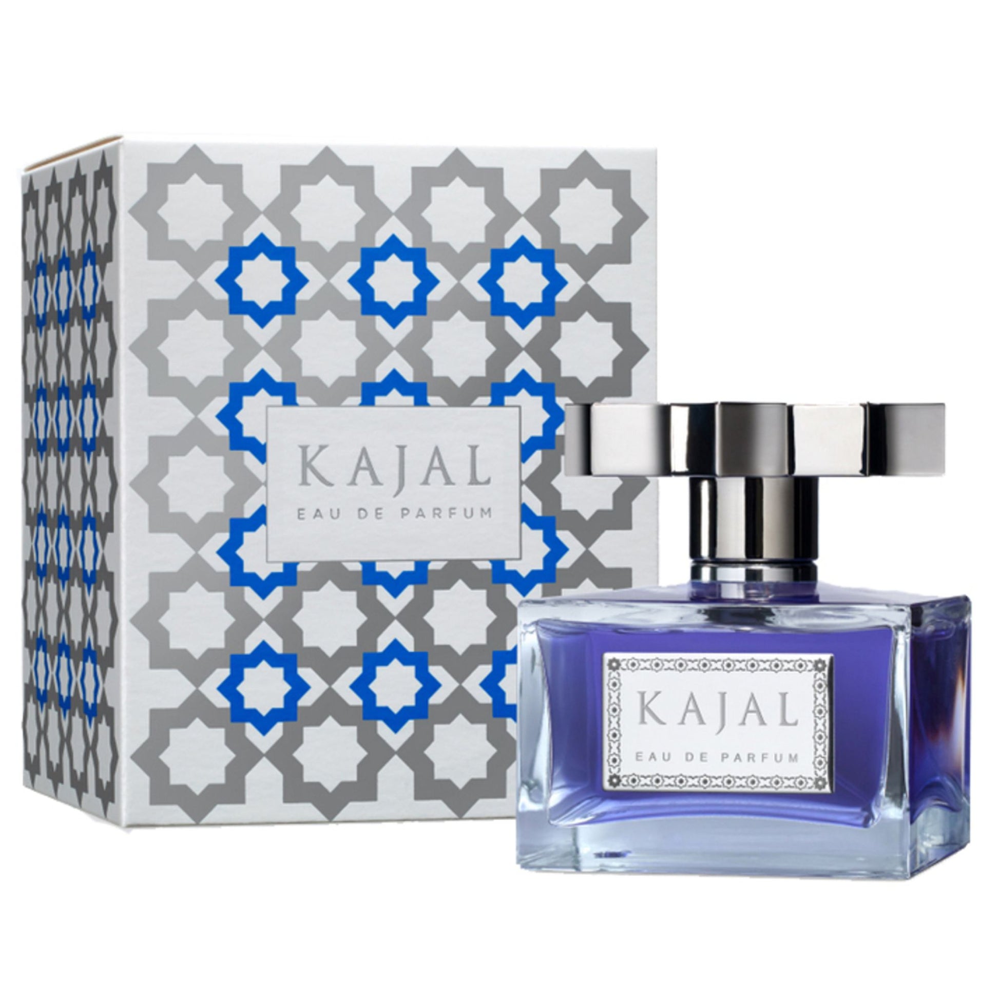 A bottle of Kajal Eau de Parfum by Kajal is displayed in front of its packaging, which features gray and blue geometric patterns.