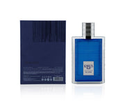 A blue Khadlaj Karus Blue Spice 100ml perfume bottle is displayed beside its matching blue box, showing the barcode and product details. This unisex fragrance is by Khadlaj.