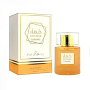 A bottle of Khumar Caramel by Wadi Al Khaleef 100ml EDP is displayed beside its matching white and gold box, a unisex fragrance from Wadi Al Khaleef.
