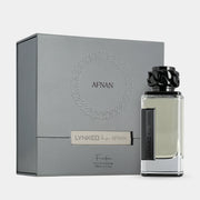 A bottle of Afnan Lynked Freedom 100ml EDP stands beside its matching grey box, both featuring the Afnan logo and product details for this aromatic spicy Eau De Parfum.