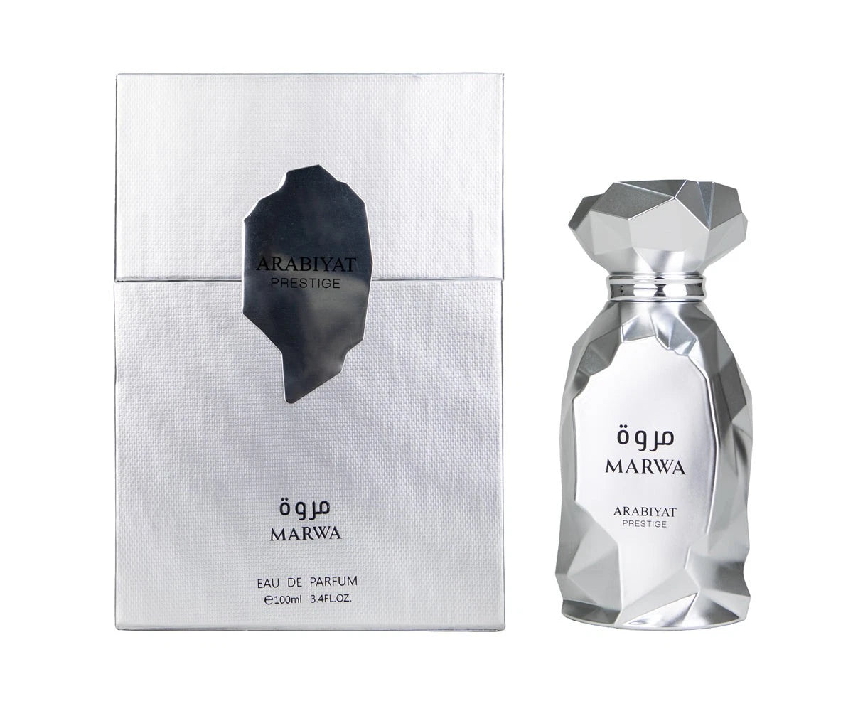A silver Marwa Arabiyat Prestige 100ml EDP perfume bottle with geometric design stands by its matching box, both labeled in English and Arabic, offering a Citrus Aromatic unisex fragrance.