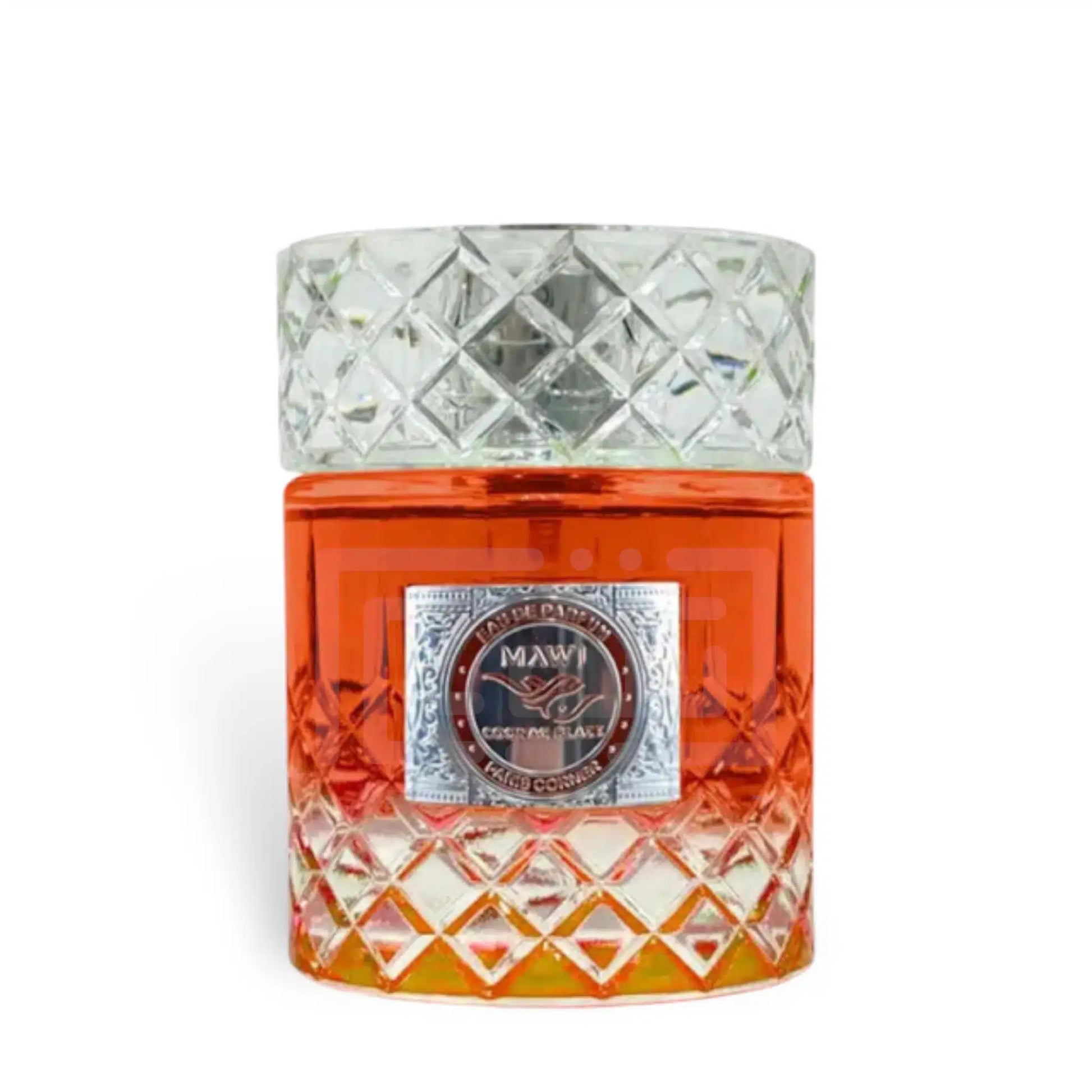 A decorative 100ml glass bottle of Paris Corner Mawj Cognag Blaze Eau De Parfum by Rio Perfumes, featuring orange liquid, a silver label, and a faceted diamond-patterned cap and base—a striking collectible fragrance.